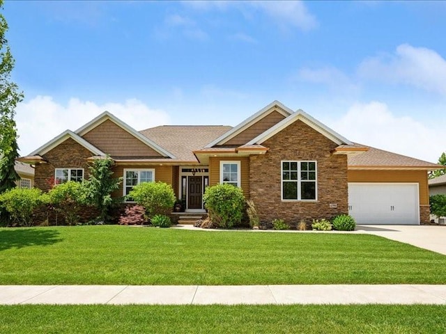 4390 Flagstick Dr, Marion, IA 52302 - craftsman house featuring a front lawn, an attached garage, and concrete driveway