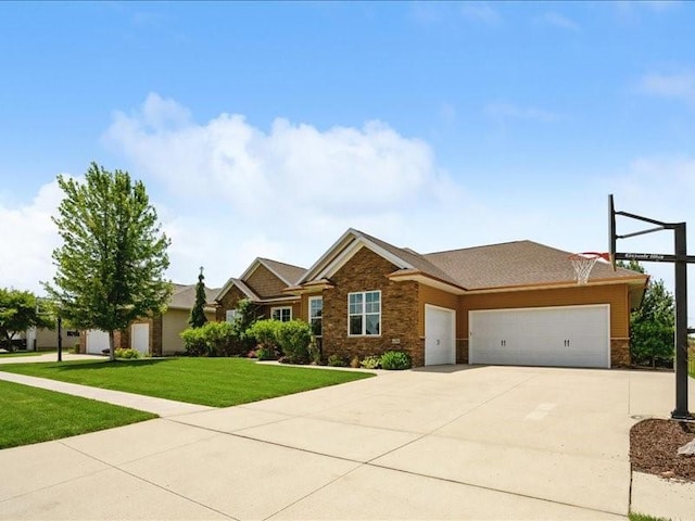 4390 Flagstick Dr, Marion, IA 52302 - view of front of house featuring a garage, a front lawn, and concrete driveway