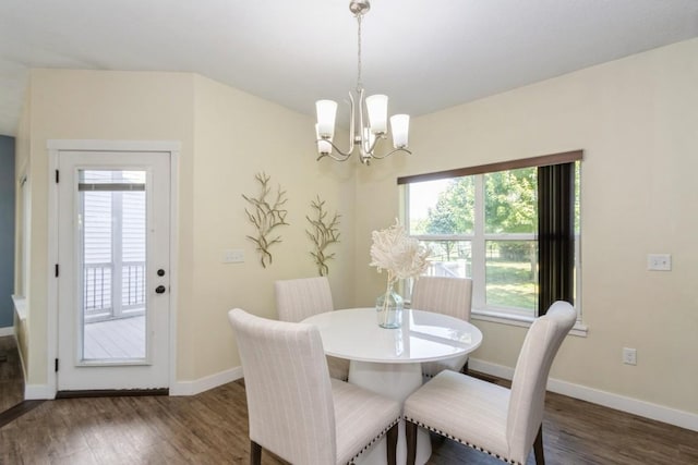 3076 Lower W Branch Rd, Iowa City, IA 52245 - dining space featuring a chandelier and wood finished floors