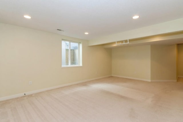 3076 Lower W Branch Rd, Iowa City, IA 52245 - basement with light colored carpet and recessed lighting