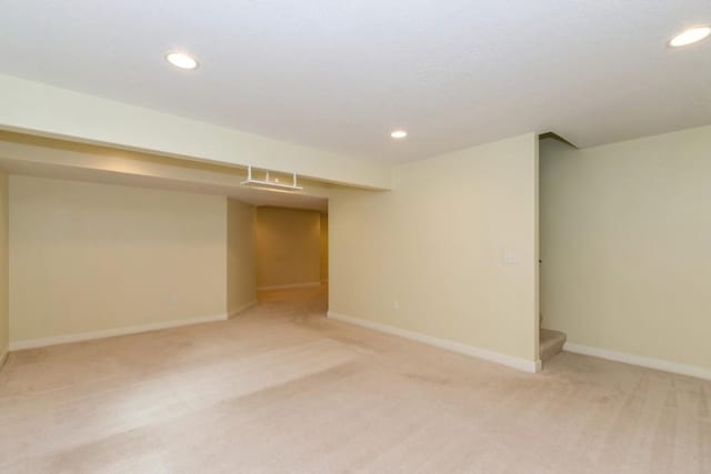 3076 Lower W Branch Rd, Iowa City, IA 52245 - finished basement featuring light carpet, recessed lighting, and stairs
