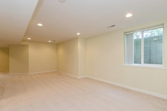 3076 Lower W Branch Rd, Iowa City, IA 52245 - empty room with light carpet and recessed lighting