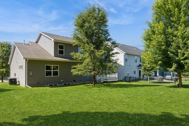 3076 Lower W Branch Rd, Iowa City, IA 52245 - rear view of property featuring a yard and roof with shingles