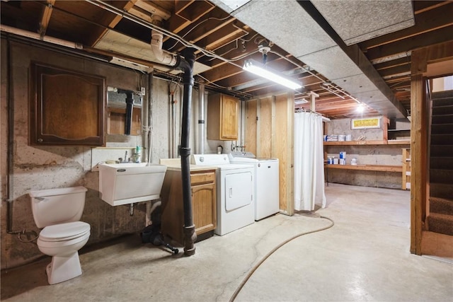 3624 Bel Air Dr SE, Cedar Rapids, IA 52403 - unfinished below grade area with a sink and washing machine and dryer