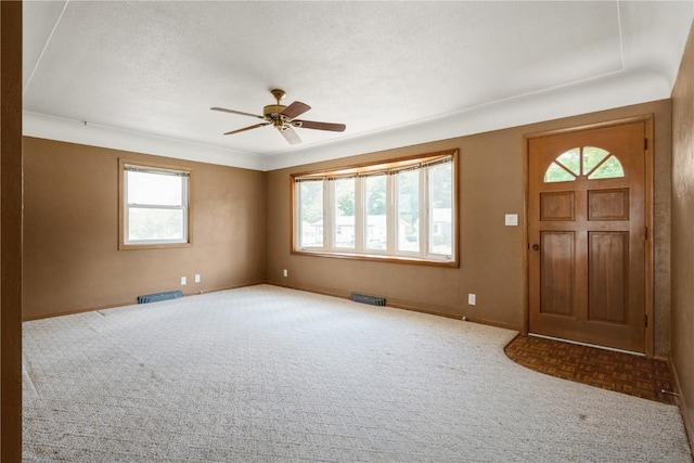 3624 Bel Air Dr SE, Cedar Rapids, IA 52403 - foyer entrance with carpet flooring and ceiling fan