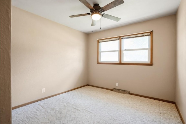 3624 Bel Air Dr SE, Cedar Rapids, IA 52403 - carpeted spare room with baseboards and ceiling fan