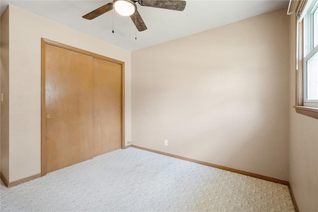 3624 Bel Air Dr SE, Cedar Rapids, IA 52403 - unfurnished bedroom with carpet floors, a closet, and ceiling fan