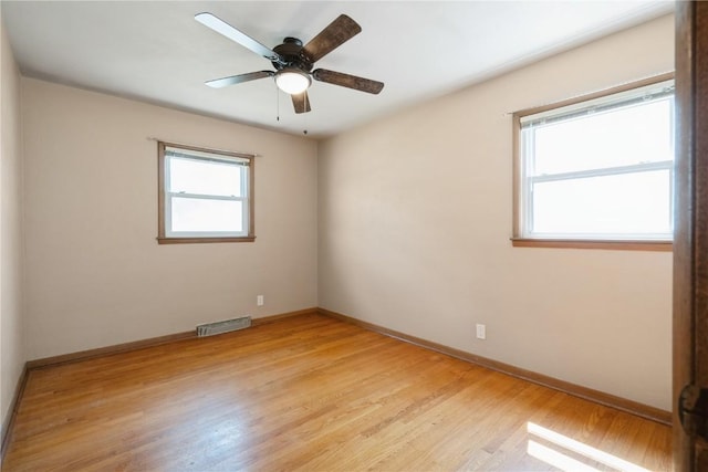 3624 Bel Air Dr SE, Cedar Rapids, IA 52403 - spare room with light wood-style flooring and ceiling fan