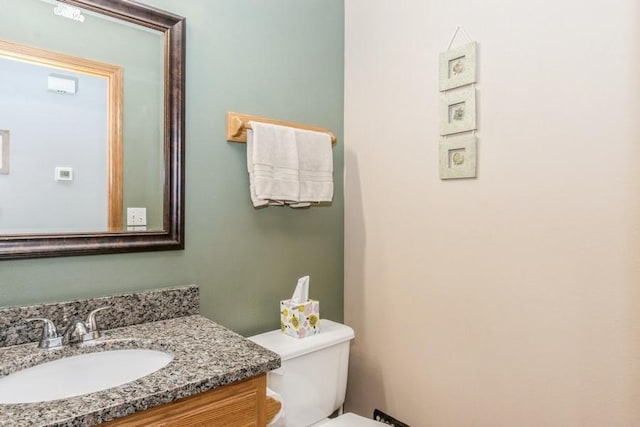 2815 Oak Crest Ct NW, Cedar Rapids, IA 52405 - half bath featuring vanity and toilet