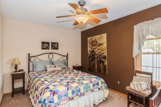2815 Oak Crest Ct NW, Cedar Rapids, IA 52405 - bedroom with carpet and ceiling fan