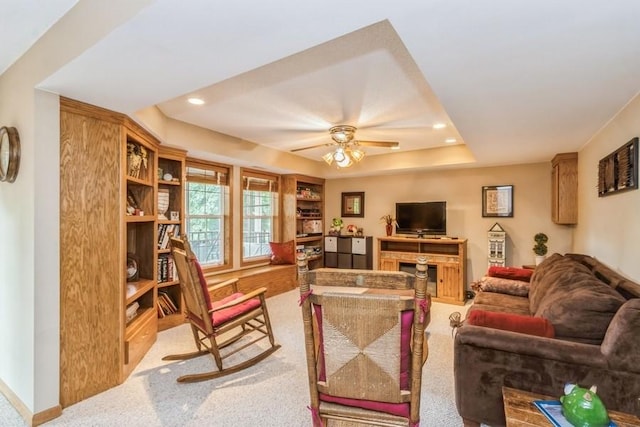 2815 Oak Crest Ct NW, Cedar Rapids, IA 52405 - carpeted living room with recessed lighting, a ceiling fan, and a raised ceiling