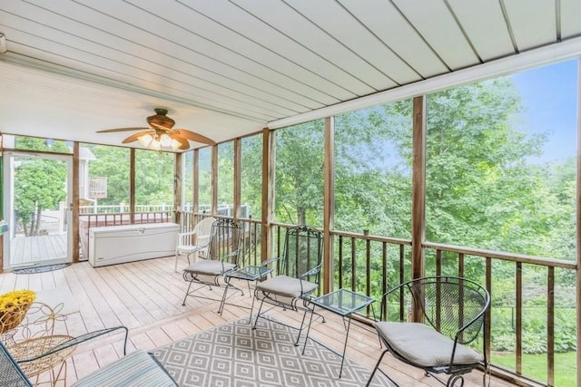 2815 Oak Crest Ct NW, Cedar Rapids, IA 52405 - unfurnished sunroom featuring ceiling fan