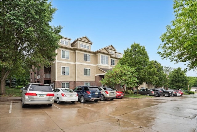 1848 W Benton St, Iowa City, IA 52246 - view of building exterior featuring uncovered parking