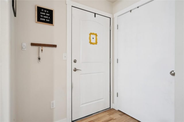 1848 W Benton St, Iowa City, IA 52246 - entryway with light wood-style floors