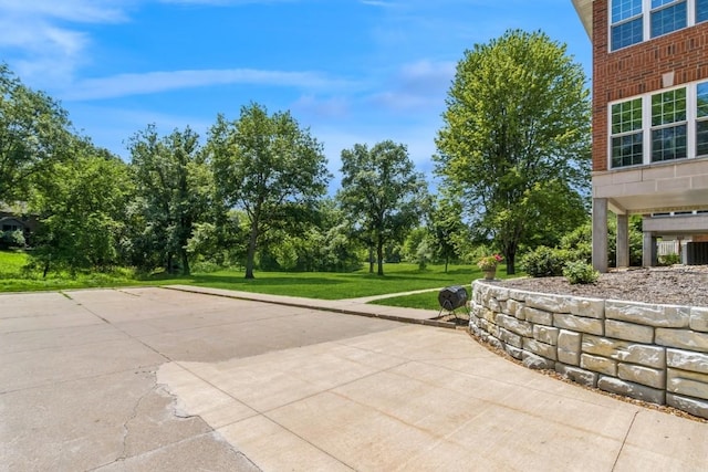 2601 Hickory Trl Unit 1, Iowa City, IA 52245 - view of patio / terrace featuring view of wooded area