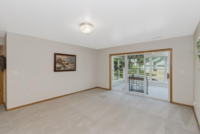 2601 Hickory Trl Unit 1, Iowa City, IA 52245 - empty room featuring light colored carpet