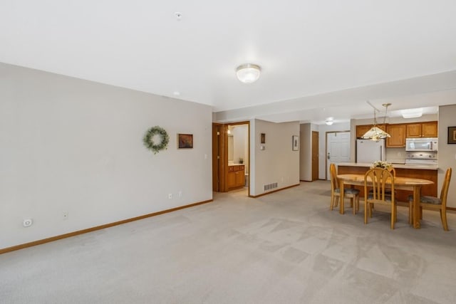 2601 Hickory Trl Unit 1, Iowa City, IA 52245 - dining area with light colored carpet