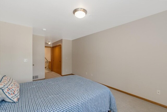 2601 Hickory Trl Unit 1, Iowa City, IA 52245 - bedroom with light carpet
