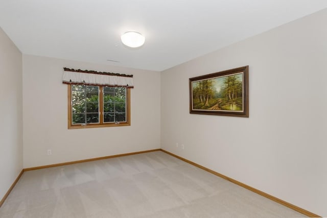 2601 Hickory Trl Unit 1, Iowa City, IA 52245 - spare room featuring light colored carpet