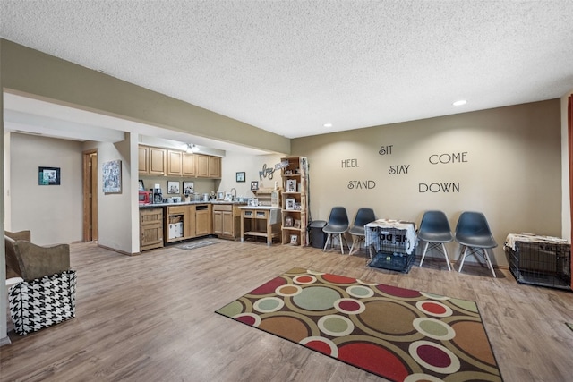 2060 Holiday Rd, Coralville, IA 52241 - living room with a textured ceiling, light wood-style floors, and recessed lighting