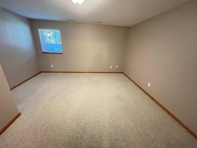 640 Magnolia Ln Unit 1, Marion, IA 52302 - carpeted spare room featuring baseboards