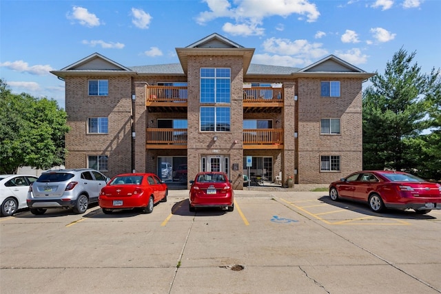 620 Colton Cir NE Unit 11, Cedar Rapids, IA 52402 - view of building exterior with uncovered parking