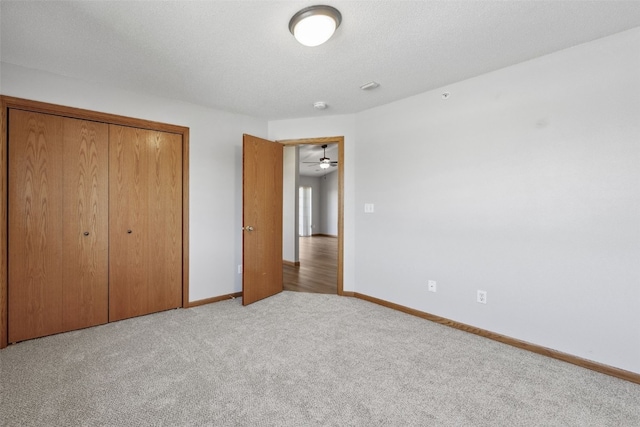 620 Colton Cir NE Unit 11, Cedar Rapids, IA 52402 - unfurnished bedroom with a closet and carpet flooring