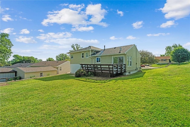 705 Grant Wood Dr SE, Cedar Rapids, IA 52403 - rear view of property with a wooden deck and a lawn