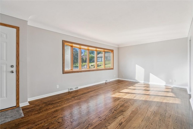705 Grant Wood Dr SE, Cedar Rapids, IA 52403 - unfurnished room with wood finished floors and baseboards
