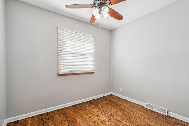 705 Grant Wood Dr SE, Cedar Rapids, IA 52403 - unfurnished room with wood finished floors and a ceiling fan