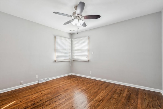 705 Grant Wood Dr SE, Cedar Rapids, IA 52403 - spare room featuring a ceiling fan and wood finished floors