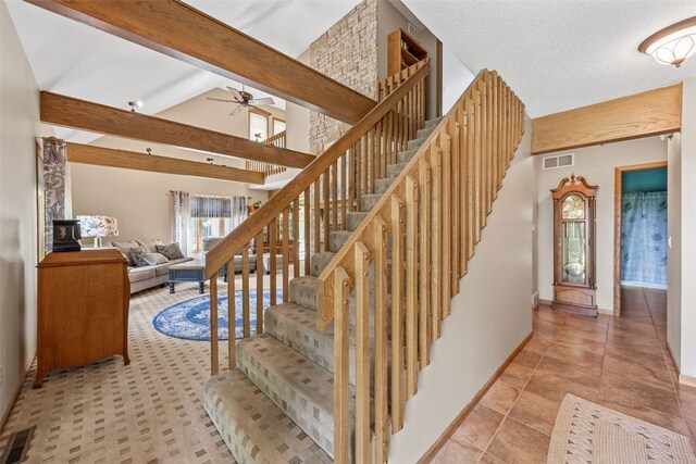 3496 E Otter Rd, Marion, IA 52302 - staircase featuring a ceiling fan and lofted ceiling