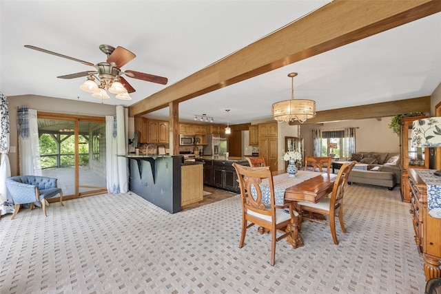 3496 E Otter Rd, Marion, IA 52302 - dining room featuring light carpet, ceiling fan, a chandelier, and beamed ceiling