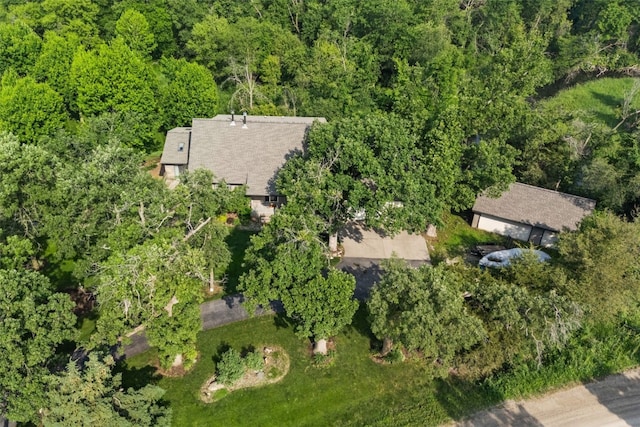 3496 E Otter Rd, Marion, IA 52302 - aerial view of property and surrounding area featuring a heavily wooded area