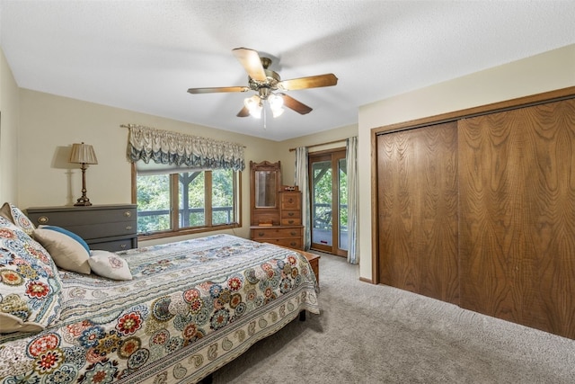3496 E Otter Rd, Marion, IA 52302 - carpeted bedroom with access to outside and ceiling fan