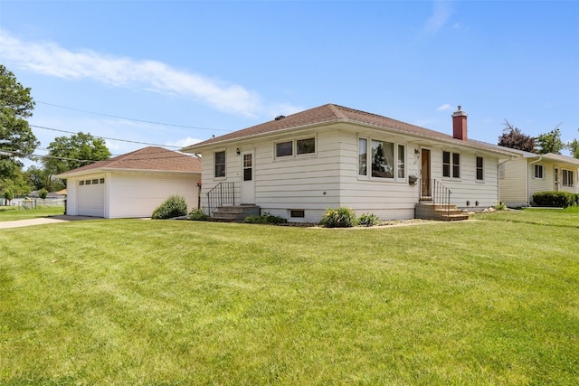 425 28th St NW, Cedar Rapids, IA 52405 - view of front of home featuring a chimney, a front yard, an outdoor structure, and a garage