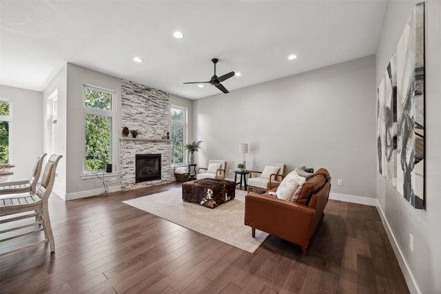 19 Pond Rdg, Coralville, IA 52241 - living area featuring a ceiling fan, a fireplace, dark wood finished floors, and recessed lighting