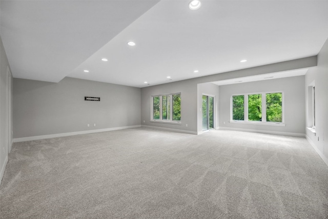 19 Pond Rdg, Coralville, IA 52241 - unfurnished room featuring plenty of natural light, recessed lighting, and carpet