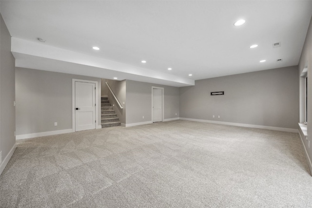 19 Pond Rdg, Coralville, IA 52241 - finished basement with recessed lighting, stairs, and light colored carpet