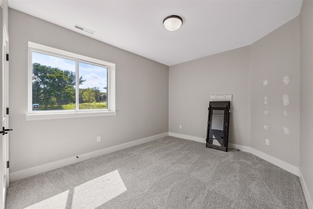 19 Pond Rdg, Coralville, IA 52241 - spare room featuring carpet floors and baseboards