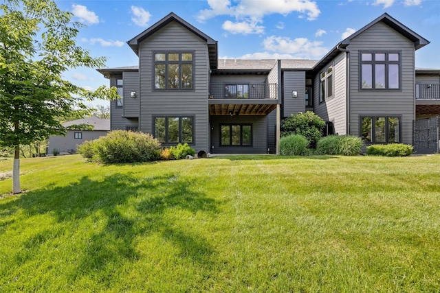 19 Pond Rdg, Coralville, IA 52241 - rear view of house featuring a yard and a balcony