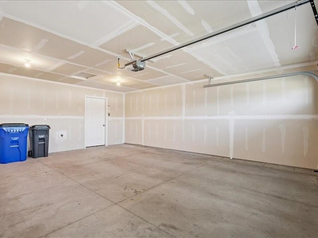 3602 Bluebird Dr SW, Cedar Rapids, IA 52404 - garage featuring a garage door opener