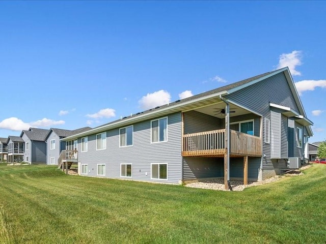 3602 Bluebird Dr SW, Cedar Rapids, IA 52404 - back of house featuring a lawn and ceiling fan