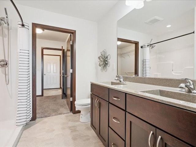 3602 Bluebird Dr SW, Cedar Rapids, IA 52404 - bathroom with a shower with curtain and double vanity