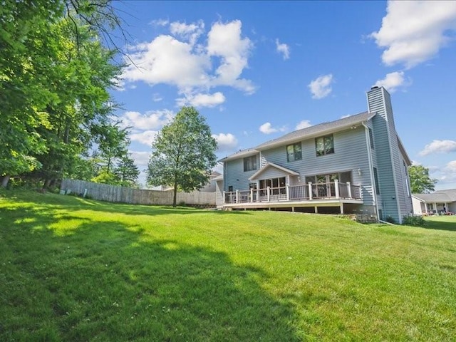 2066 Vista Cir NW, Cedar Rapids, IA 52405 - back of house with a deck and a chimney