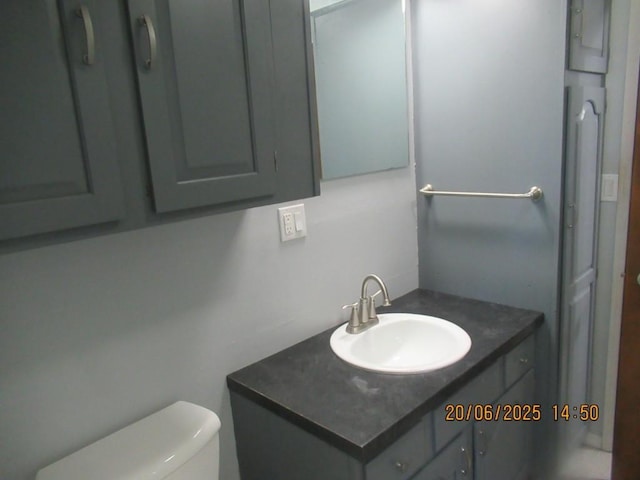 302 Meridian St, Tipton, IA 52772 - half bath featuring vanity and toilet