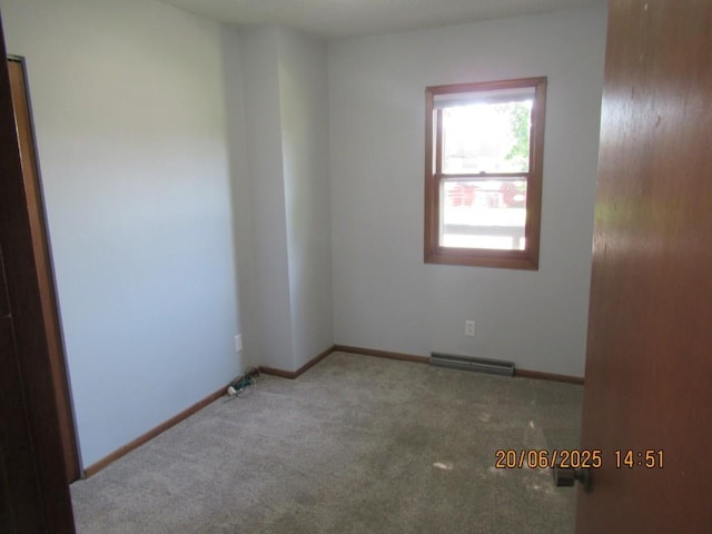 302 Meridian St, Tipton, IA 52772 - spare room with carpet floors and baseboards