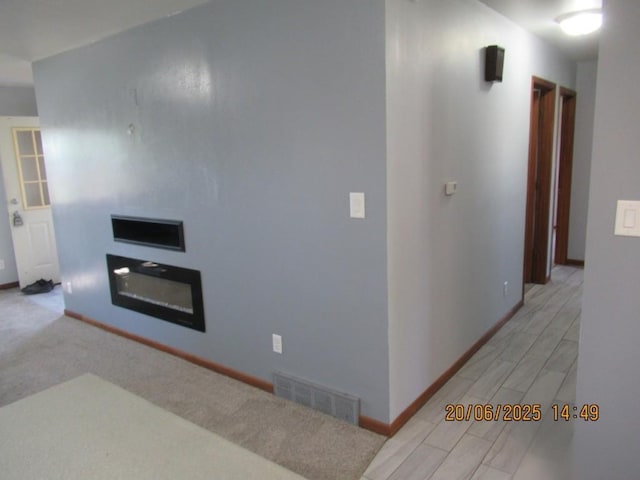302 Meridian St, Tipton, IA 52772 - corridor with baseboards
