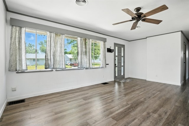 1635 Keith Dr NE, Cedar Rapids, IA 52402 - unfurnished room with wood finished floors and ceiling fan