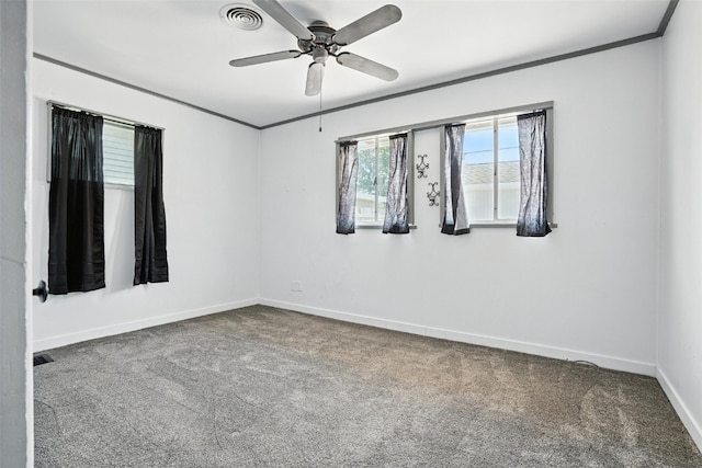 1635 Keith Dr NE, Cedar Rapids, IA 52402 - carpeted spare room with a ceiling fan and crown molding